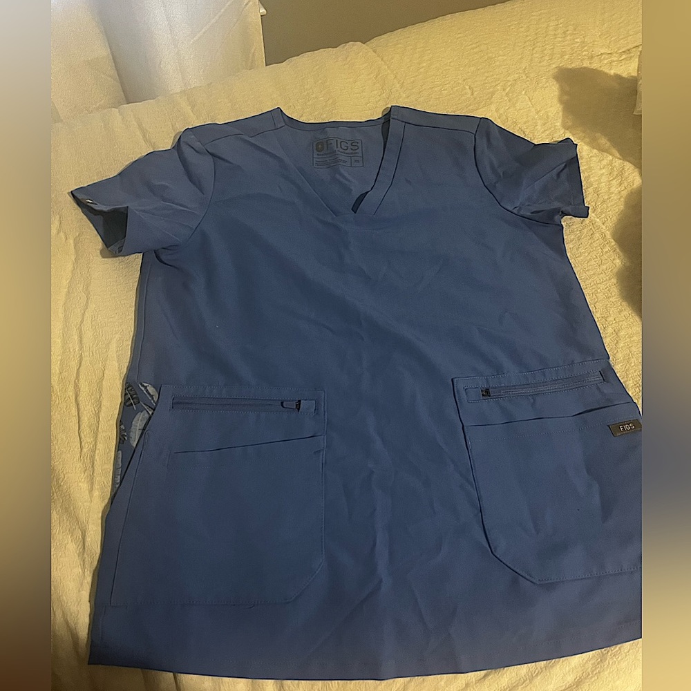 FIGS. Worn once. XS women’s ceil blue top. Limited edition pockets.